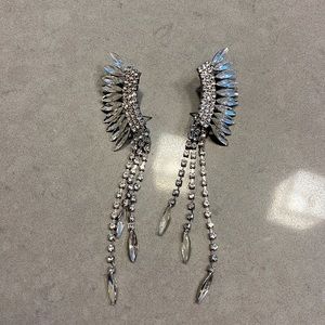 Sparkly feathered ear crawlers
